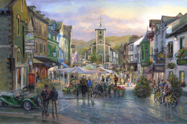 Open edition print by Graham Twyford. A populat destination in the Lake District Keswick. Late afternoon, bright yellow light are on in the houses, the road looks wet like it has just rained, a few people strolling through the village.
