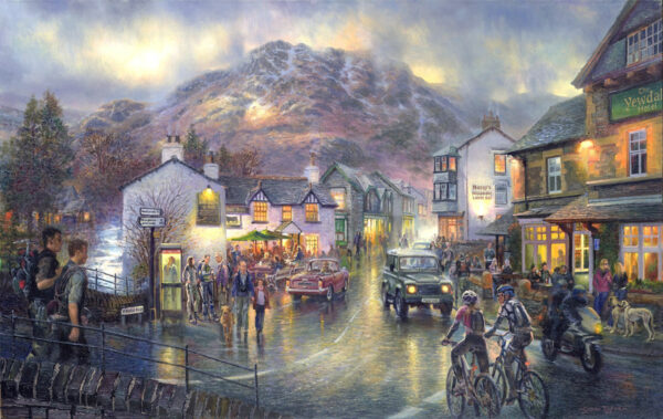 Open edition print by Graham Twyford. A populat destination in the Lake District Coniston. Late afternoon, bright yellow light are on in the houses, the road looks wet like it has just rained, a few people strolling through the village.