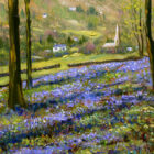 Lake District art print Spring Woodland Near Ambleside by local artist Jeff Sudders. A spring scene of a woodland with bright green grass and lots of bright blue bluebells; a few tall trees and a bright blue lake Windermere in the Lake District and some mountains in the background.