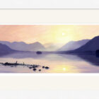 Lake District art framed print Sunrise at Derwentwater by local artist Jeff Sudders in a white frame.