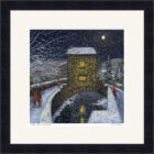 Lake District Art framed print Winter Moon Ambleside by Jeff Sudders showing Bridge House in the snow in a black frame.