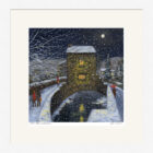 Lake District Art framed print Winter Moon Ambleside by Jeff Sudders showing Bridge House in the snow in a white frame.