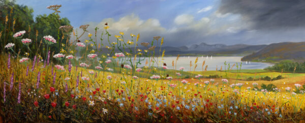 Lake District art print by Jeff Sudders. This print is showing a field with lots of colourful flowers in the foreground, yellow grass and blue lake windermere in the middle and Froswick, Ill Bell, Yoke fells and blue sky in the background.