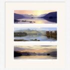 Lake District art framed print Three Views of Derwentwater by local artist Jeff Sudders in a white frame.