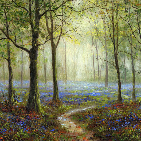 Lake District art print A May Morning by local artist Jeff Sudders of a woodland path through bluebells with hazy sunlight falling through the trees.