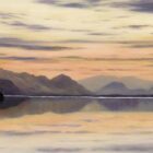 Lake District art print Evening Reflections on Derwentwater by local artist Jeff Sudders. Soft sunset light over mountains and lake in shades of orange, yellow and misty purples.