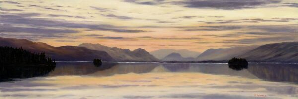 Lake District art print Evening Reflections on Derwentwater by local artist Jeff Sudders. Soft sunset light over mountains and lake in shades of orange, yellow and misty purples.