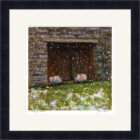 Lake District art framed print A Bit of Shelter by local artist Jeff Sudders in a black frame. Sheep take shelter from the snow in a barn doorway.