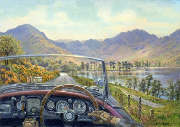 Open edition print by Graham Twyford. Part of the 'Classic driving in The Lakes' series featuring a 1962 MG Roadster. A populat destination in the Lake District Borrowdale and Honnister Pass. This print features the view of the Tarn and a magnificent view of the mountains.