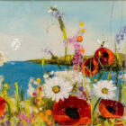 All that Glitters an original mixed media painting by Rozanne Bell. A bright shoreline with lots of flowers including poppies daisies and foxgloves with bees buzzing around