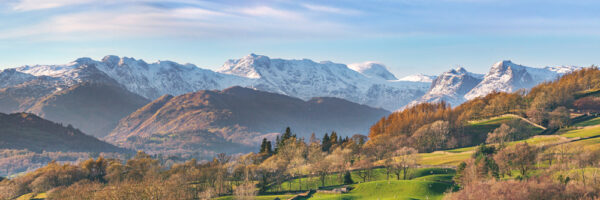 snow covers the langdale pikes bowfell and crinkle crags in this high definition photograph of the lake district by jon allison