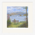 Lake District art framed print by local Artist Jeff Sudders. A couple sit on a bench and admire the view of Windermere from Bowness.