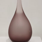 Handmade large pod vase in burgundy. Back view, air bubbles visable on right and left with being hand blown.