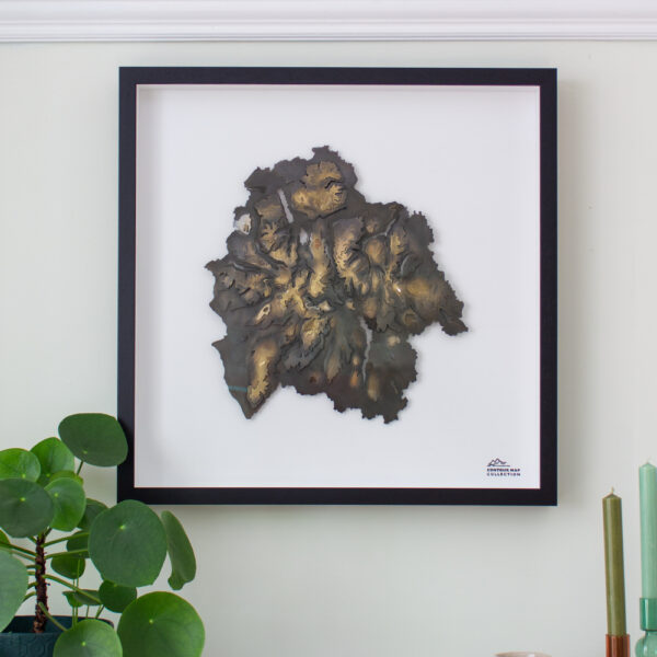 laser cut polished brass aerial artwork of the lake district national park in cumbria framed 3D art