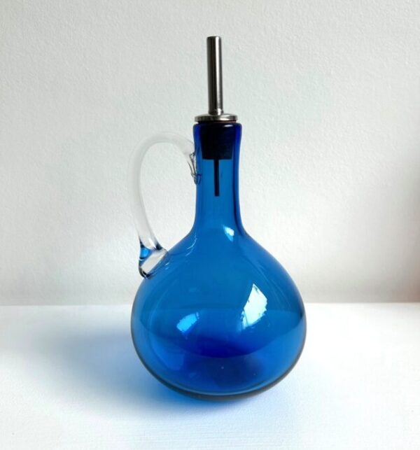 Blown glass oil pourer handmade in Britain by Loco Glass Studio.