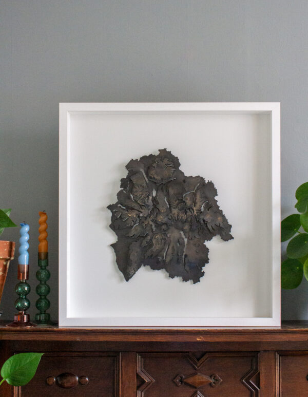 laser cut polished brass aerial artwork of the lake district national park in cumbria framed 3D art
