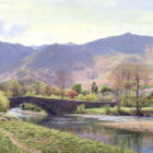 classic lake district view of the river derwent at grange in borrowdale over the bridge towards castle crag and high spy by lake district artist keith melling