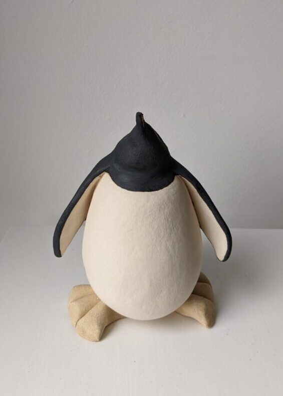 Handmade in Britain clay penguins from crafter Louise O'Connor.