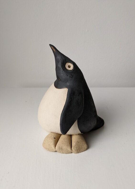 Handmade in Britain clay penguins from crafter Louise O'Connor.
