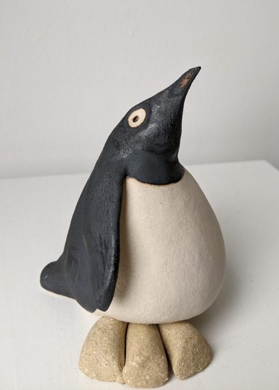 Handmade in Britain clay penguins from crafter Louise O'Connor.