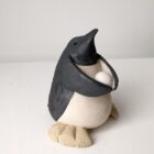 Handmade in Britain clay penguins from crafter Louise O'Connor.