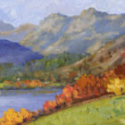 Lake District art print of Windermere by local artist Jeff Sudders. Mountains and Langdale Pikes with the lake and colourful trees and fields in the foreground.