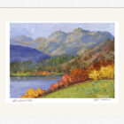 Lake District art framed print of Windermere by local artist Jeff Sudders in a white frame.