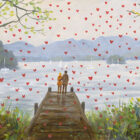 Lake District art by Jeff Sudders. Love is in the Air Windermere features a couple on a jetty overlooking the lake and mountains towards Ambleside surrounded by falling red love hearts.