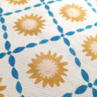 Organic cotton tea towel in blue sunburst design by Miller Honeyman close up of fabric.