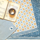 Organic cotton tea towel in blue sunburst design by Miller Honeyman
