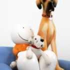 Limited Edition Sculpture by Doug Hyde featuring character and dogs sitting on sofa