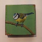 An original acrylic painting on wooden tile by Steve Ferguson.