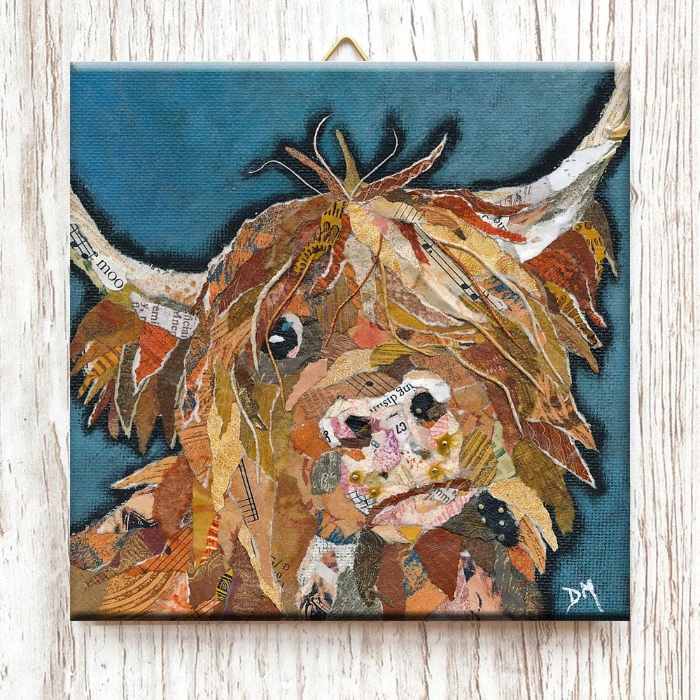 Ceramic wall tile with metal hook of a Highland Cow by Dawn Maciocia
