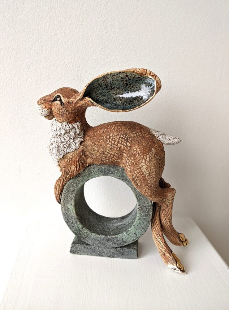 Medium Reclining Hare on a Hoop Ceramic Hare sculpture handmade by Gin Durham