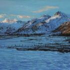 Lake District art by local artist simon whitfield. oil painting of the view of the Langdale Valley near Ambleside in winter with the langdale pikes and surrounding fells covered in snow