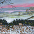 Lake District art by Jeff Sudders. Hole in the Wall features a winter sunset with sheep sheltering near a stone wall with snow and distant lakes and mountains