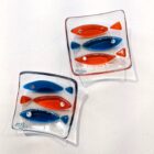 Hand fused glass ring dish using teal and orange glass by Mother and Daughter glass.