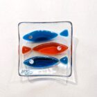 Hand fused glass dish using teal and orange glass by Mother and Daughter glass.