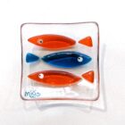Hand fused glass ring dish using teal and orange glass by Mother and Daughter glass.