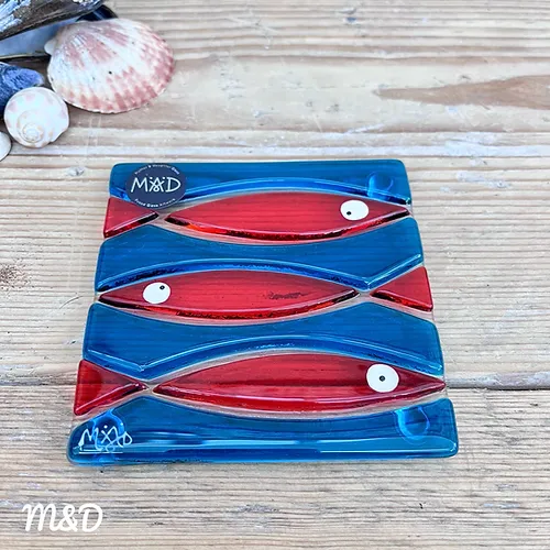 Hand fused glass coaster using teal and orange glass by Mother and Daughter glass.