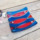Hand fused glass dish using teal and orange glass by Mother and Daughter glass.