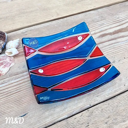 Hand fused glass dish using teal and orange glass by Mother and Daughter glass.