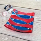 Hand fused glass dish using teal and orange glass by Mother and Daughter glass.