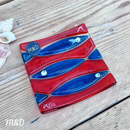 Hand fused glass dish using teal and orange glass by Mother and Daughter glass.