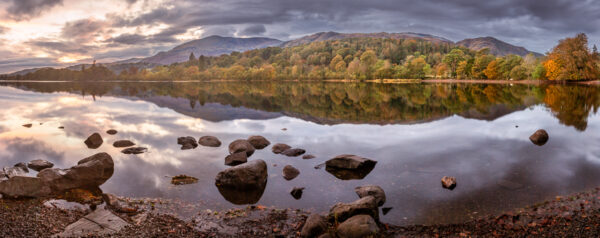 Lake District Art Photographer Print by local artist Nathan Buckley. Autumn reflections over coniston water featuring old man of coniston yew pike and wetherlam