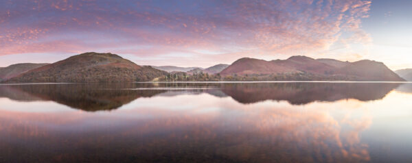 Lake District Art Photographer Print by local artist Nathan Buckley. evening colour over ullswater lake with sunset over hallin fell high street high dodd place fell