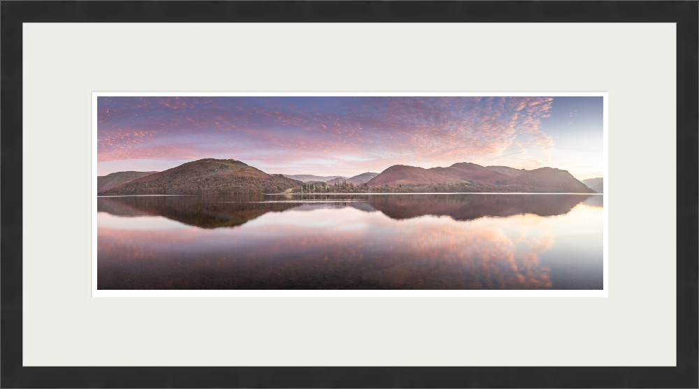 Lake District Art Photographer Print by local artist Nathan Buckley. evening colour over ullswater lake with sunset over hallin fell high street high dodd place fell