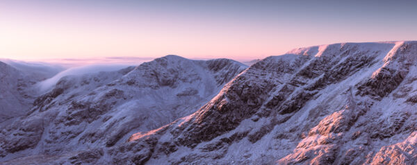 Lake District Art Photographer Print by local artist Nathan Buckley. winter glow nethermost pike helvellyn range in dawn light alphine glow