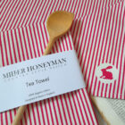Ribbon Stripe Pink organic cotton tea towel by local textile designer Miller Honeyman.