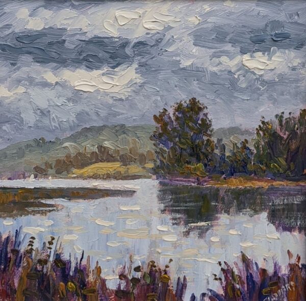 lake district art original oil painting by local artist Jeff Sudders. Silver Lake Windermere featuring distant mountains a cloudy sky and autumn bushes and trees